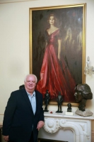 Michael Smith with the portrait of Princess Grace in the background